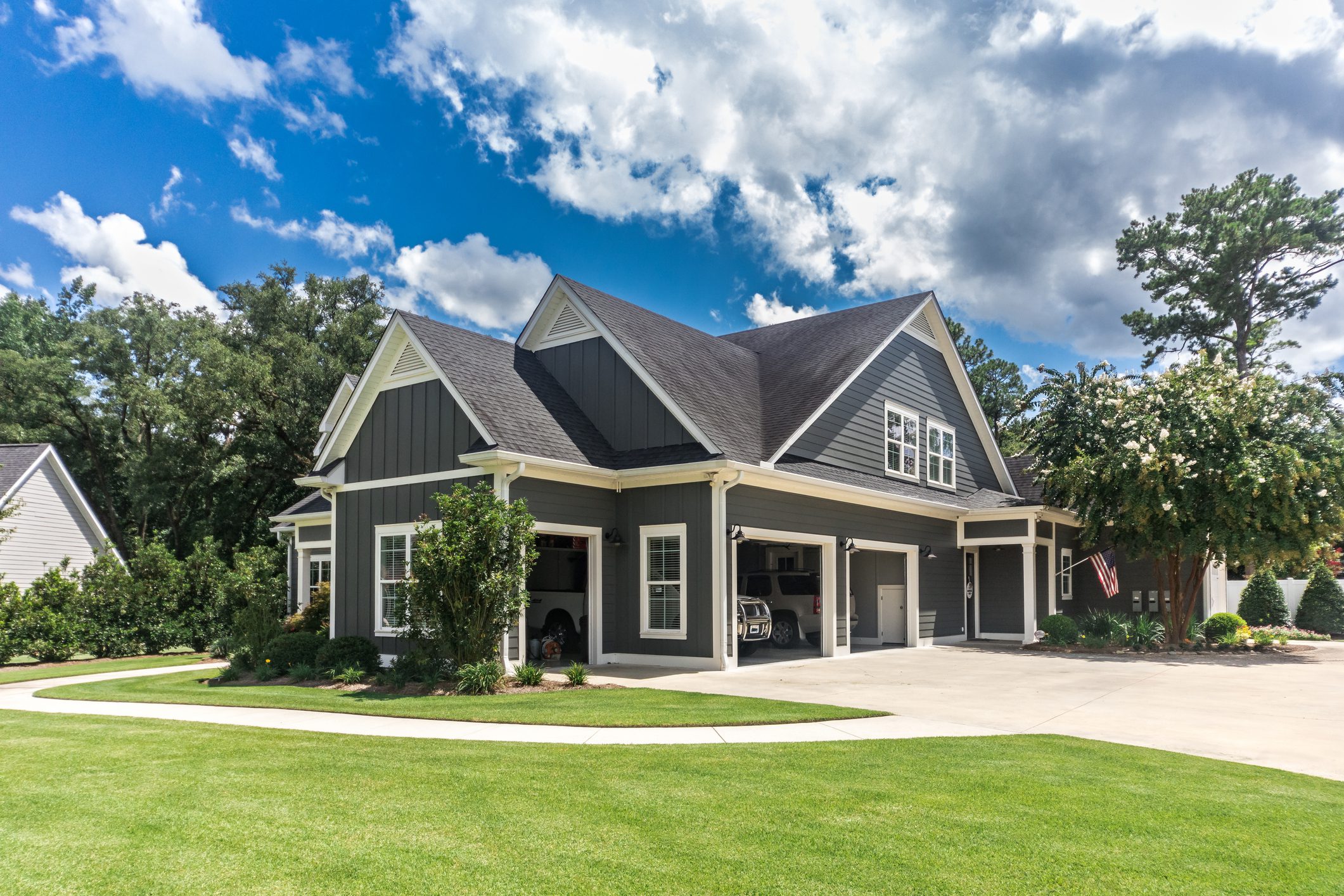 Charming house surrounded by green lawn